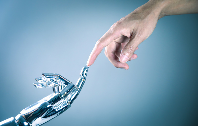 Human and robot fingers touching