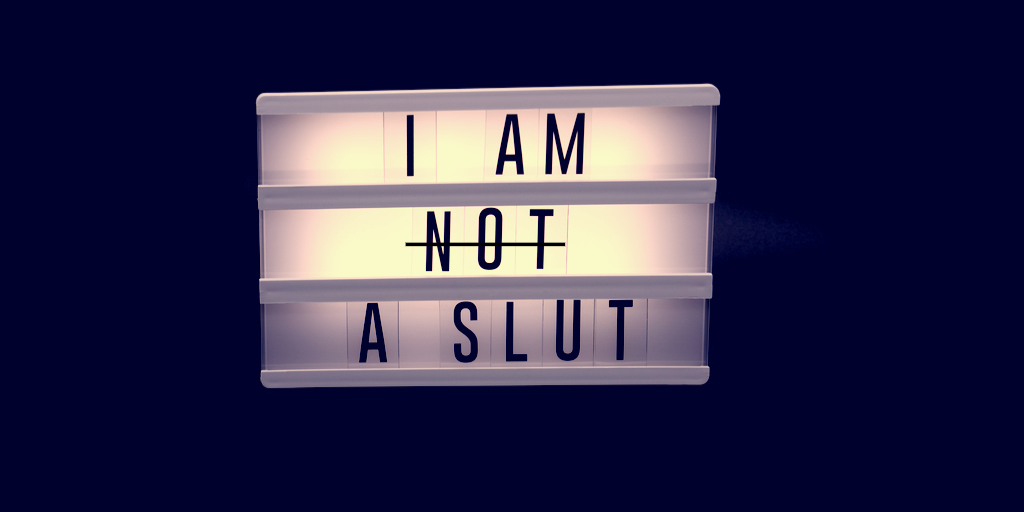 Sign that says "I Am Not a Slut" but "Not" is crossed out