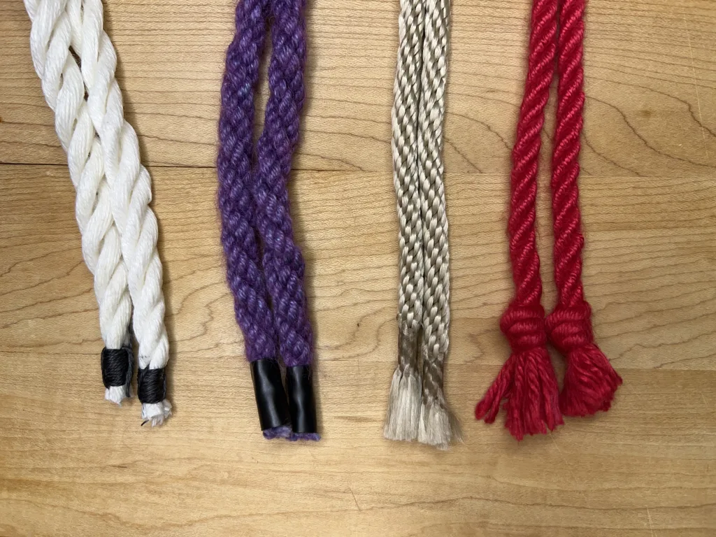 Photo showing four types of rope ends: whipped, taped, melted, and knotted