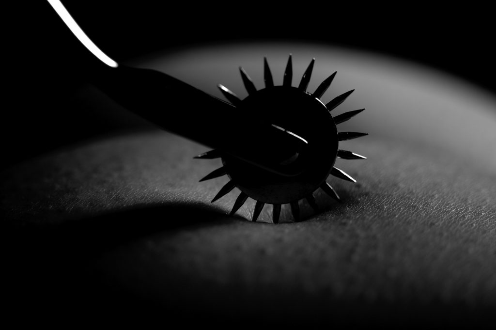 Wartenberg wheel on bare skin